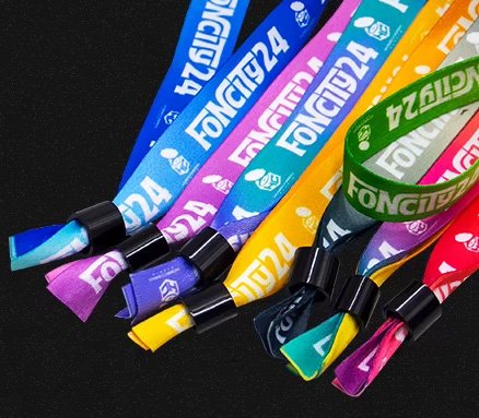 Close-up of one-time ABS breakaway lock on a satin event wristband